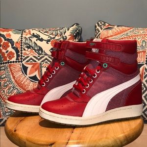Puma high top heel sneakers